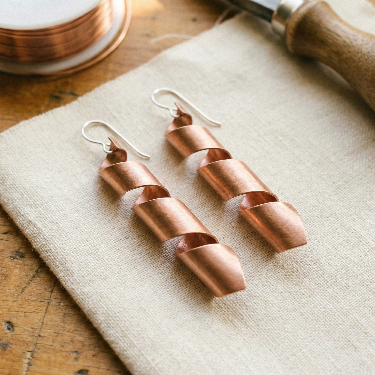 Pendientes de cobre Ocaso